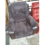 A single faux leather and brown cloth reclining armchair