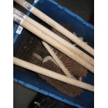 A box of large brushes and 4 brush handles
