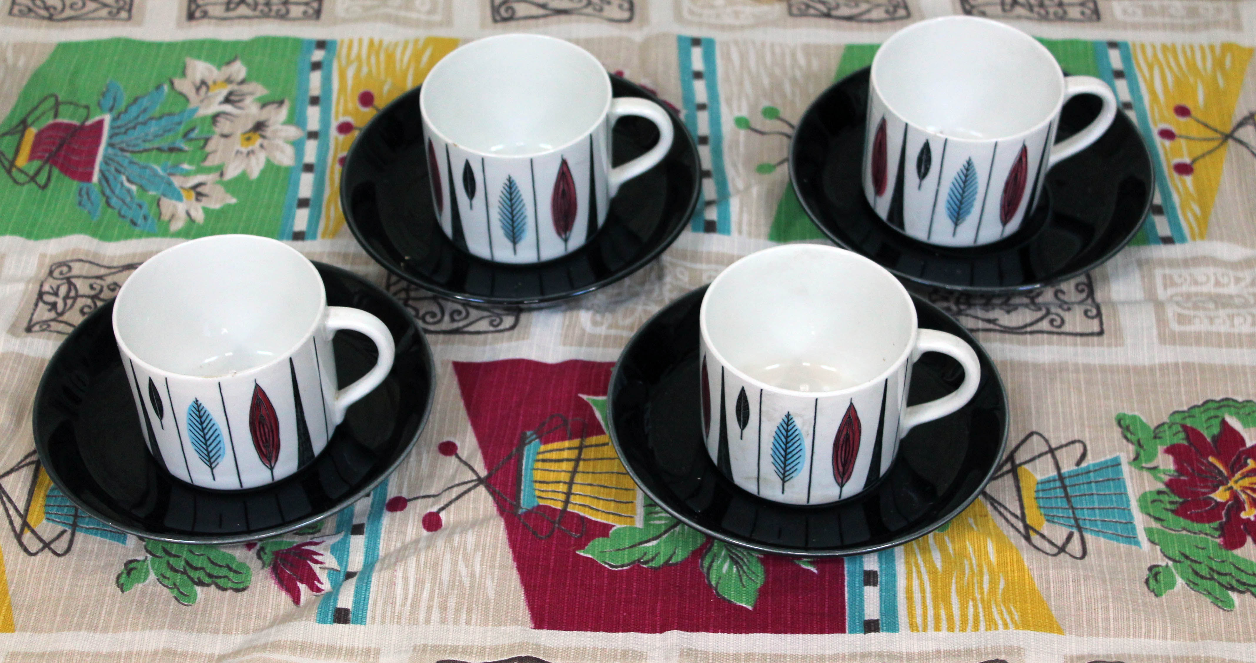 Vintage Rorstrand Swedish cups and saucers by Marianne Westwood and a small piece of vintage fabric.