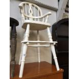A child's Windsor type painted wooden high chair