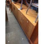 A low teak sideboard