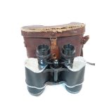 A pair of Corona 20x50 binoculars with leather case.
