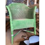 A lime green painted Lloyd Loom chair