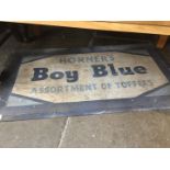 A vintage advertising rubber mat "Horner's Boy Blue Assortment of Toffees"