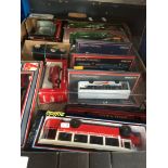 A box of model buses and railway items
