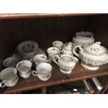 Shelf of Royal Stafford china