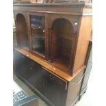A reproduction lounge display cabinet
