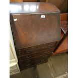 Repro walnut narrow bureau