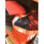 2 bags of various clothing items to include checker trousers, jackets, etc