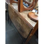 An oak drop leaf table