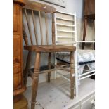 An elm seated spindle chair