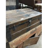 A metal and wood bound trunk