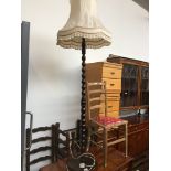 A bobbin turned standard lamp