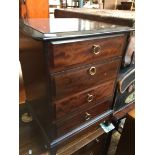 A Stag Minstrel bedside chest of four drawers