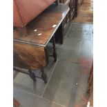 An oak drop leaf table