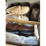 A box of various shoes