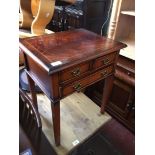 A reproduction inlaid side table.