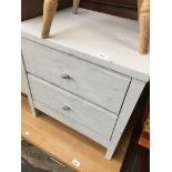 A 2 drawer small grey chest