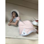 Large Nadal figurine of girl resting