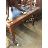 An Edwardian two drawer library table