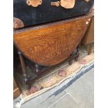 An oak drop leaf table