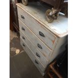 A painted pine chest of drawers