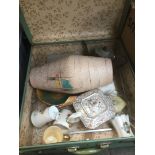 A vintage suitcase containing bric a brac to include Royal memorabilia