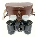 A pair of Yashica 8x40 binoculars with leather case.