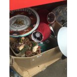 A large box of misc including table lamps, games, pottery, Xmas items, etc