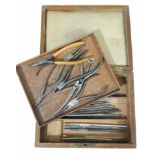 A cased set of jewellery/watch maker's pliers and files.