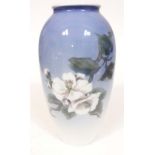 A Royal Copenhagen porcelain vase decorated with flowers and a butterfly, height 27cm. Condition -