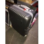 A hard shell luggage suitcase on wheels