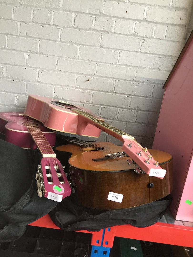3 guitars with soft cases