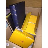 A box of photographic paper, a Kodak Easyshare camera, Kodak Easyshare printer, 2 empty photo albums