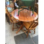 A pine table and chairs