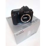 A Canon EOS 10D digital SLR camera body, untested.