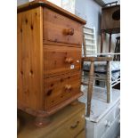 A pine bedside cabinet