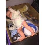 A box of soft toys, a doll, etc