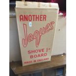 A boxed Jaques shove board