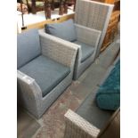 A 4 piece grey rattan style garden furniture set
