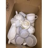 A box of kitchen pottery