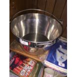 A chromed cooking pot