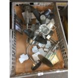 A box of outdoor lights and electrical wall sockets