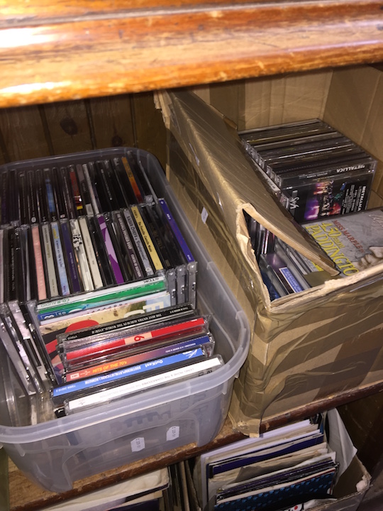 2 boxes of various CDs