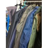 7 coats - some rain coats and a quantity of suit jackets and trousers