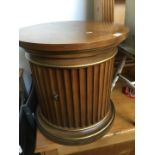 A mahogany cylindrical cabinet
