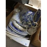 A box of blue and white pottery