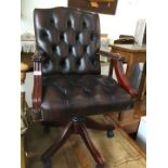 A Chesterfield style chair office swivel chair