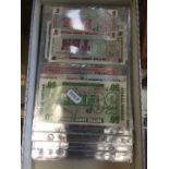 Tray of world bank notes