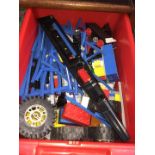 A tub of Lego including railway track and carriages